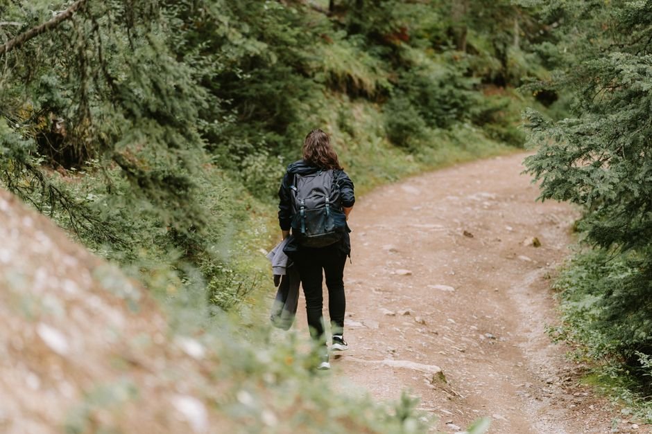 exercise and depression: Woman hiking nature trail