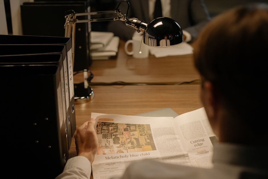 mental health insurance coverage: Person reading documents desk