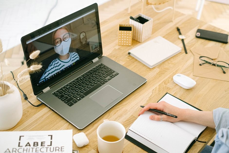 online psychiatrist: Laptop video call desk home